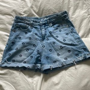 Most adorable blue jean shorts with black smiley faces